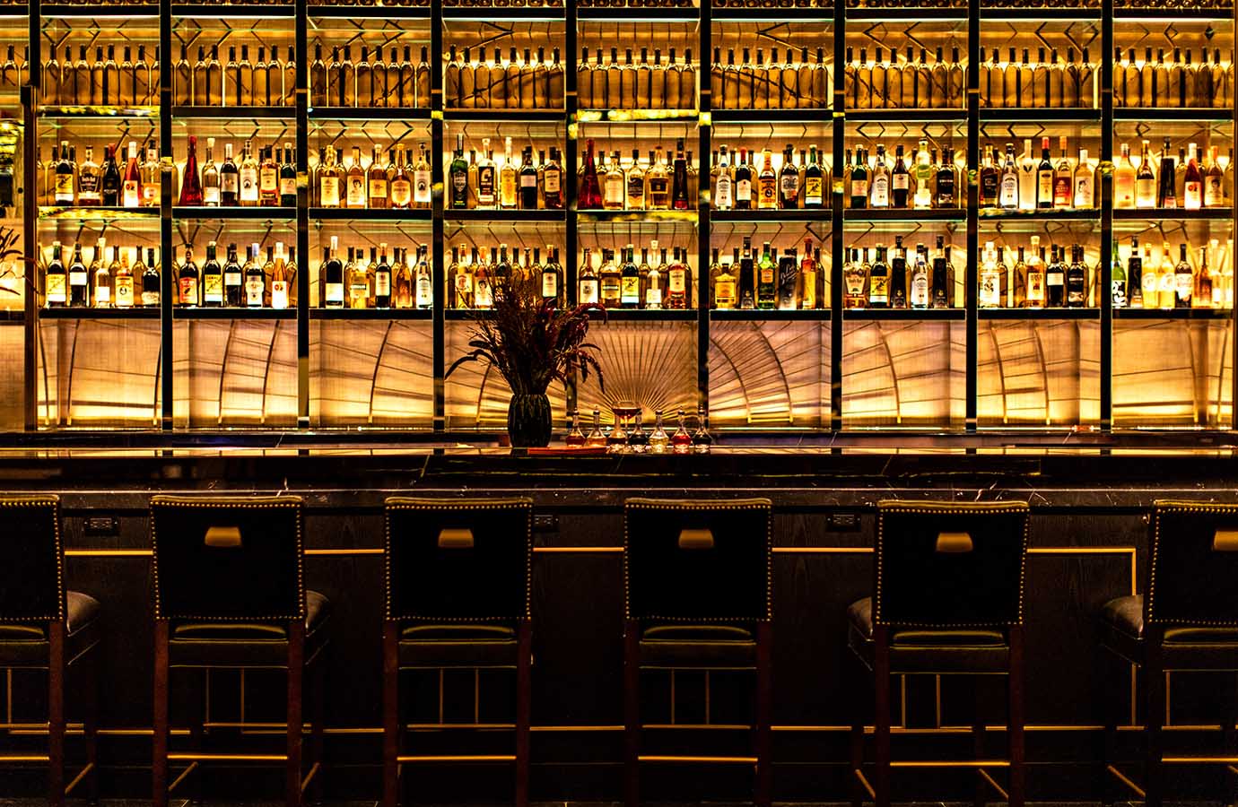 Elegant lit bar with alcohol on display
